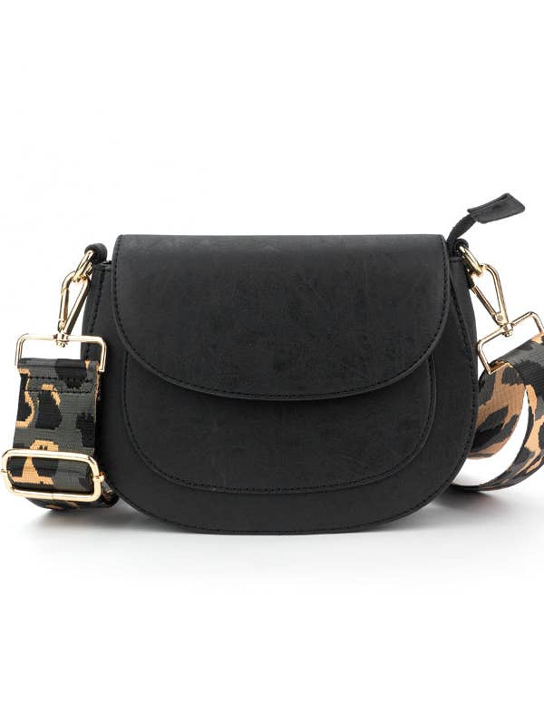 The beautiful Quinn Crossbody vegan leather bag from Threaded Pear is the perfect take-anywhere bag. This stunning bag features a compact design, but large enough for your must-have essentials providing the best of both worlds!
Details:
Bag size: 12" W x 9" H x 3.5" W
Zipper top closure with tassel
Interior zipper pocket
Adjustable shoulder strap: 30"-55", buckle to buckle
Gold hardware
Color: Black
Strap: Grey Leopard 