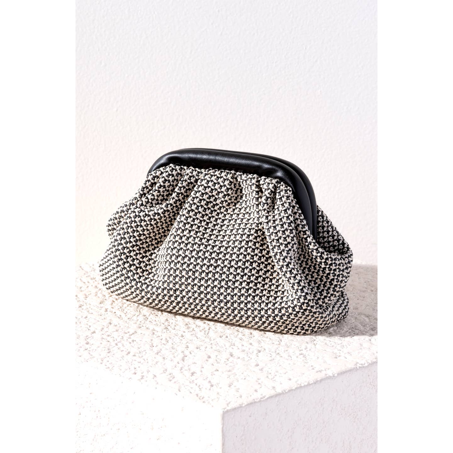 Turn heads everywhere you go with the Sonya Clutch. Made with an elegant woven design and PU details, this bag is a perfect companion to the beach or the bar. Polypropylene, raffia and smooth PU, magnetic frame closure, 1 inner slip pocket.
Details
• Dimensions: 12 x 2.5 x 6 in (30.5 x 6.4 x 15.2 cm)