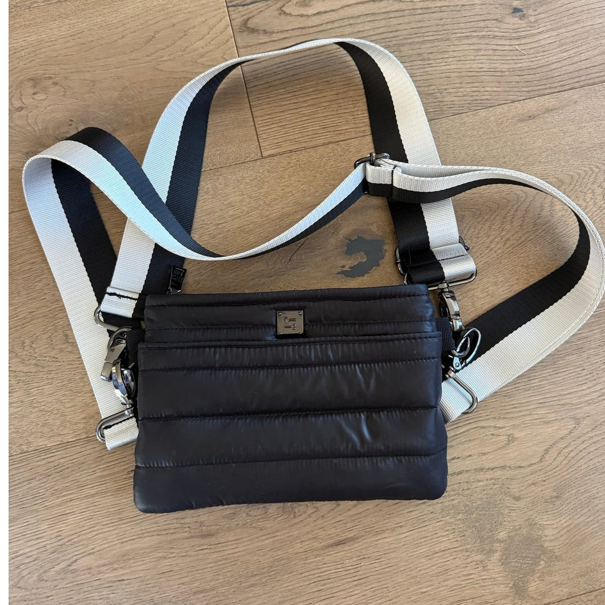 Think Royln Wingman Baguette Crossbody Bag - Black Puffer with Striped Strap