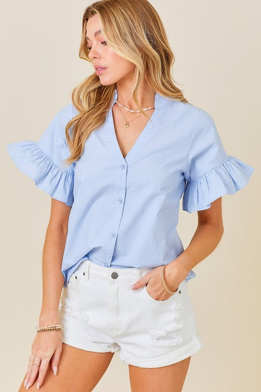 The Abby Top by Style U features a stylish v-neck design with ruffle detailing, adding a chic touch to your wardrobe. Made with high-quality materials, and available in various sizes, this top is perfect for any occasion. Expertly designed for a comfortable fit, you'll love the look and feel of this top.