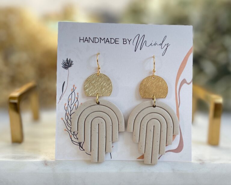 The Amalfi Earrings are beautifully handmade with soft linen colored clay dangling from a brass connector.&nbsp; These statement-making babes are lightweight but deliver maximum impact; Just as cute for everyday as they are for a special occasion like a wedding.