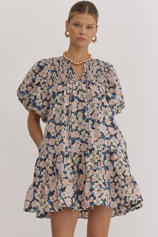 This elegant Amanda Dress features a lovely floral print, v-neck design, and bubble sleeves. The elastic cuffs provide a comfortable fit while the dress maintains its shape. It is lined, woven, and lightweight for a perfect balance between style and comfort. Additionally, it is non-sheer, making it suitable for all occasions.


Fabric Content:&nbsp; 100%COTTON
Model:&nbsp; 5'10" and wearing size Small.
Color:&nbsp; Charcoal Blue&nbsp;