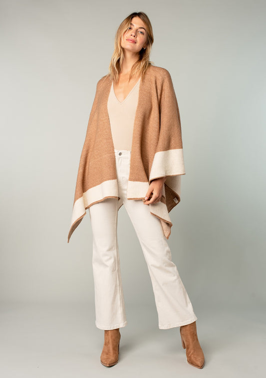 Relaxed Color Block Cape Cardigan Poncho

This poncho features an open front design and is made of stretchy, soft, and smooth knit fabric. Its relaxed and comfortable fit makes it perfect for the Fall season.

Color: Camel/Ivory
Mindy's Boutique 