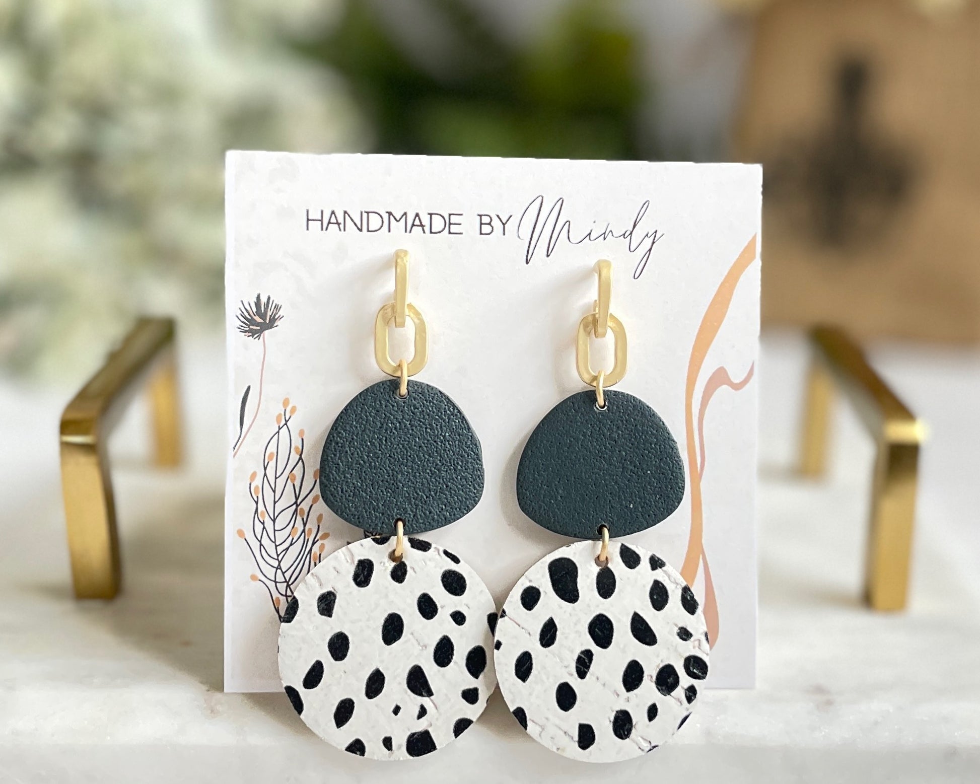 Bella Earrings - Mindy's Boutique - Make a statement in these beauties! These lightweight clay, brass and leather earrings make a beautiful combination to add the most perfect finishing touches to any outfit.