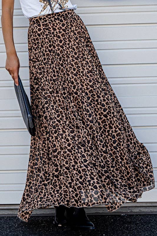 The Janelle Skirt boasts a striking leopard animal print, creating a modern and sophisticated look. With its pleated design and midi length, this skirt offers a stylish yet versatile addition to any wardrobe.

Fabric: POLYESTER