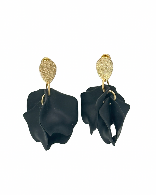 Expertly crafted with elegant black flower petals and rose gold teardrop posts, these one-of-a-kind earrings are guaranteed to add a striking touch to any outfit.

Hypoallergenic, lightweight, nickel, lead, and cadmium free.