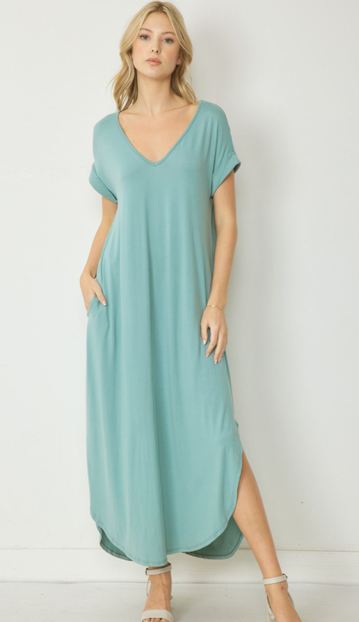 This v-neck maxi dress is made of jersey knit and features a pocket detail on the side. It has a permanent rolled sleeve and a rounded hem. The dress is unlined and lightweight. Additionally, it is a knit material and not sheer.

Fabric Content 94%POLYESTER 6%SPANDEX