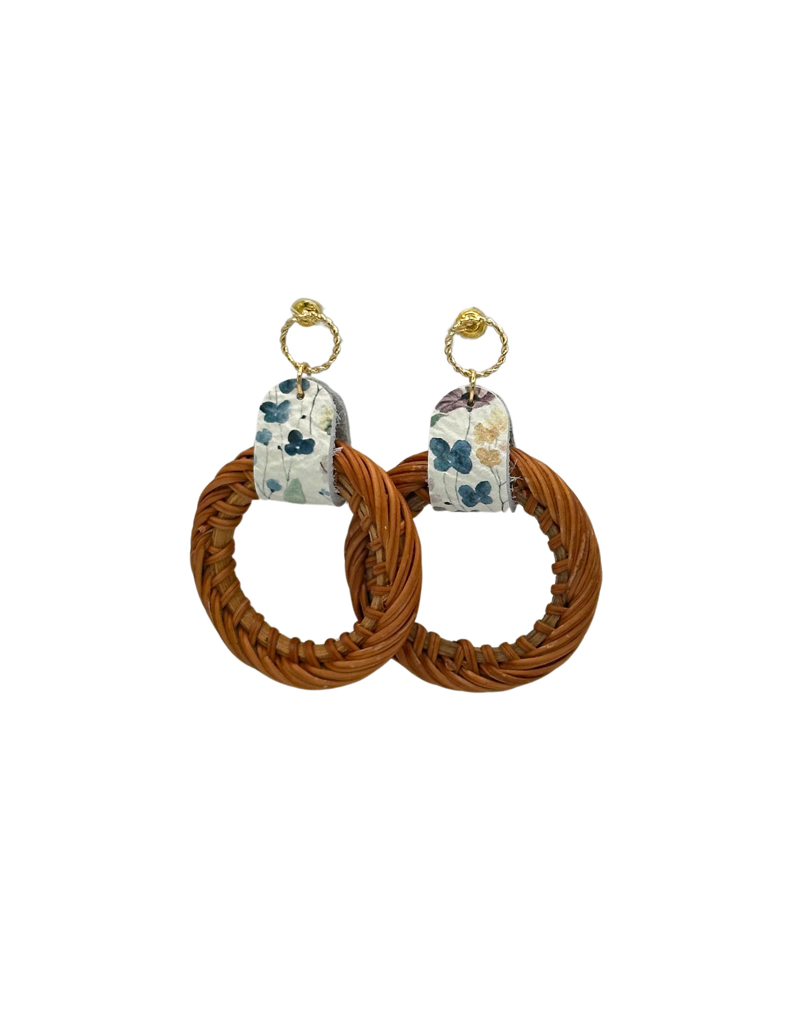 Crafted from natural rattan and wheat fields leather, the Siria Earrings bring a touch of rustic charm to any outfit while adding a subtle pop of color. Please note that the actual color may slightly differ from the one pictured.

Hypoallergenic, lightweight, nickel, lead, and cadmium free.

Length 2.50 inches