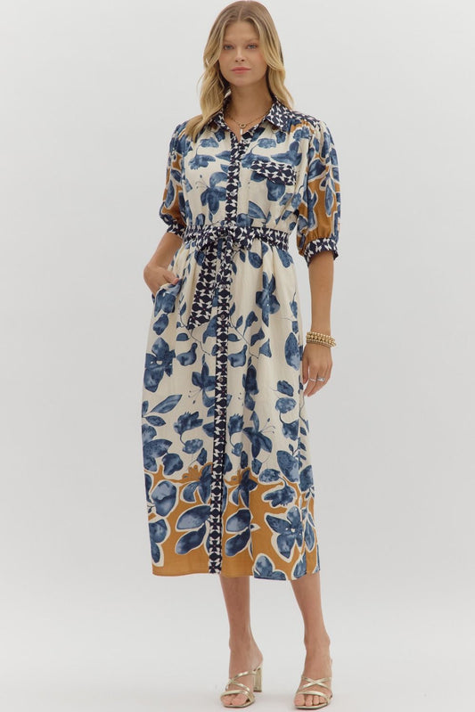 Woman wearing a floral dress with a white background